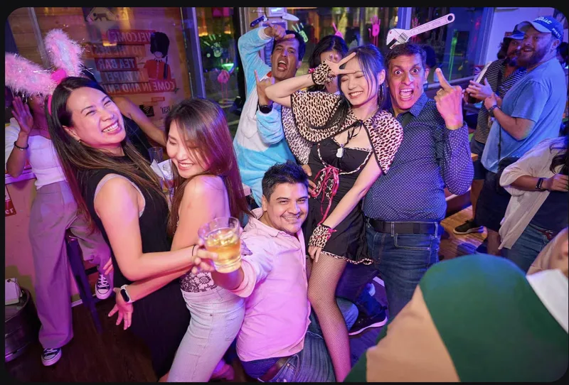 Party guests posing together in costumes
