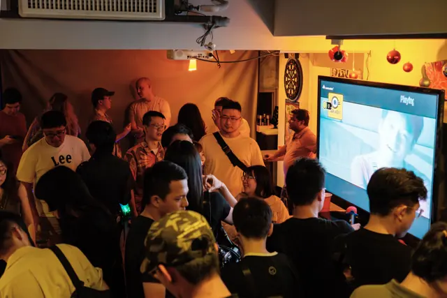 Guests gathered in the karaoke room