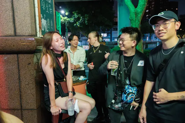 Guests chatting outside the venue
